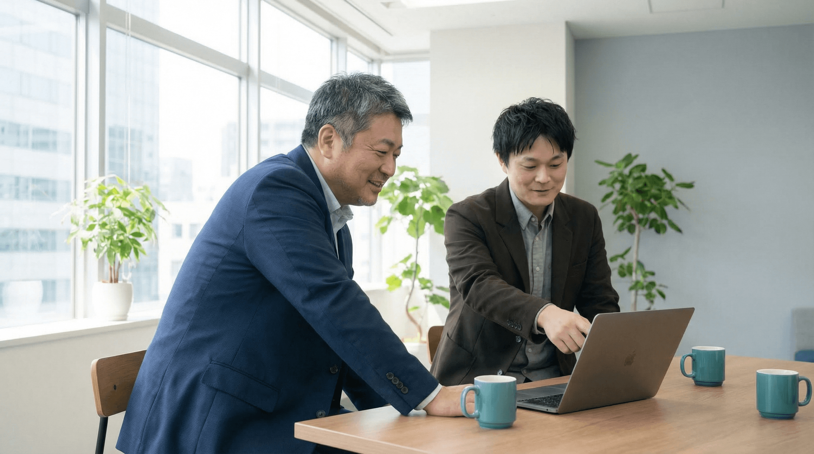 経営者とAI顧問が打ち合わせをしているシーン